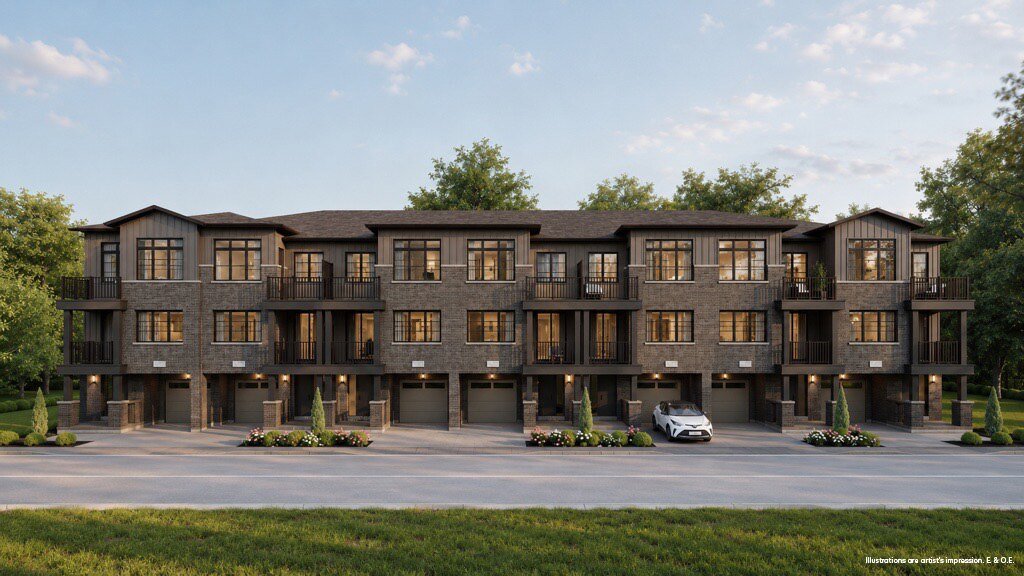 Townhomes with balconies and garages at The Bogart Hills